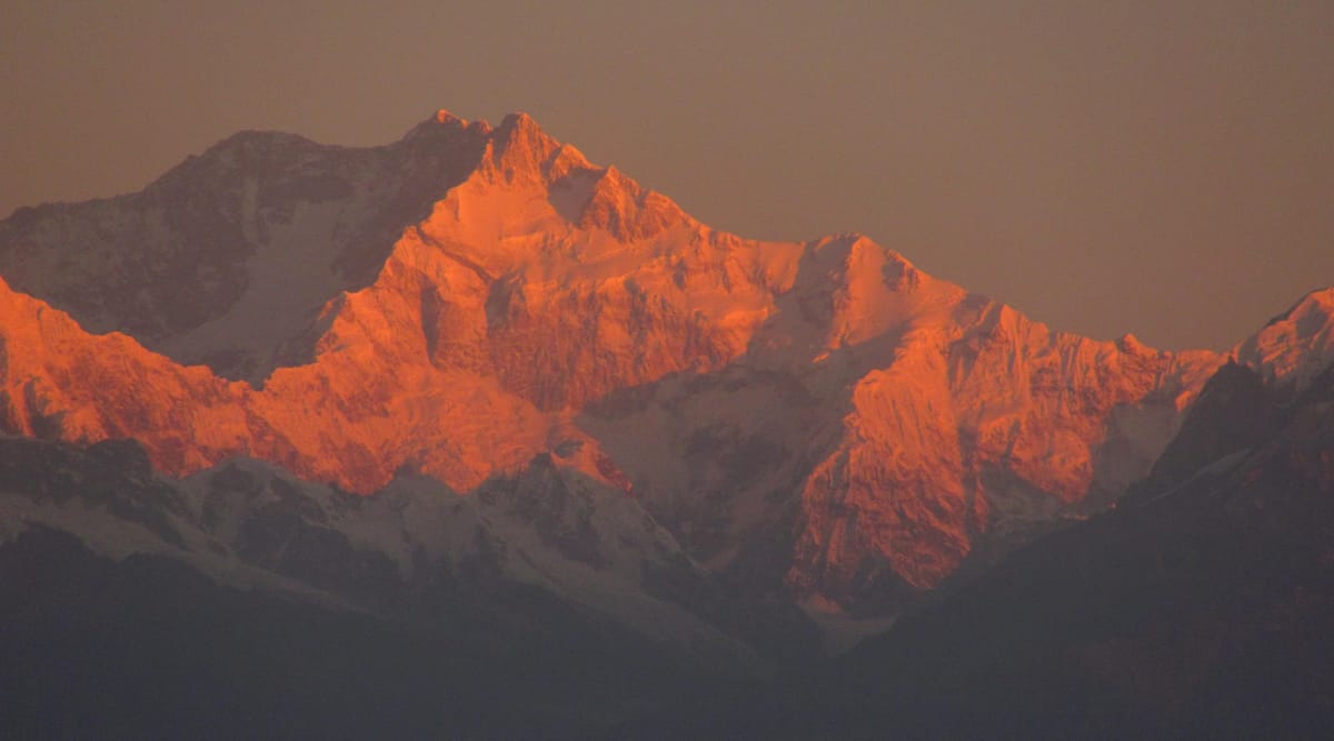 First light on the Kangchenjunga massif seen from Darjeeling